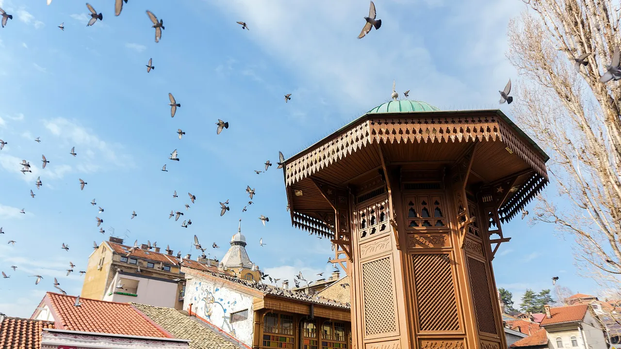 The Bascarsija bazaar in Sarajevo with market stalls and the old wooden shopfronts