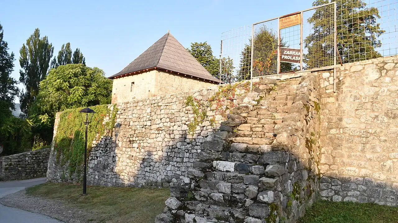 The stone walls of Kastel fortress on the green bank of the Vrbas river in Banja Luka