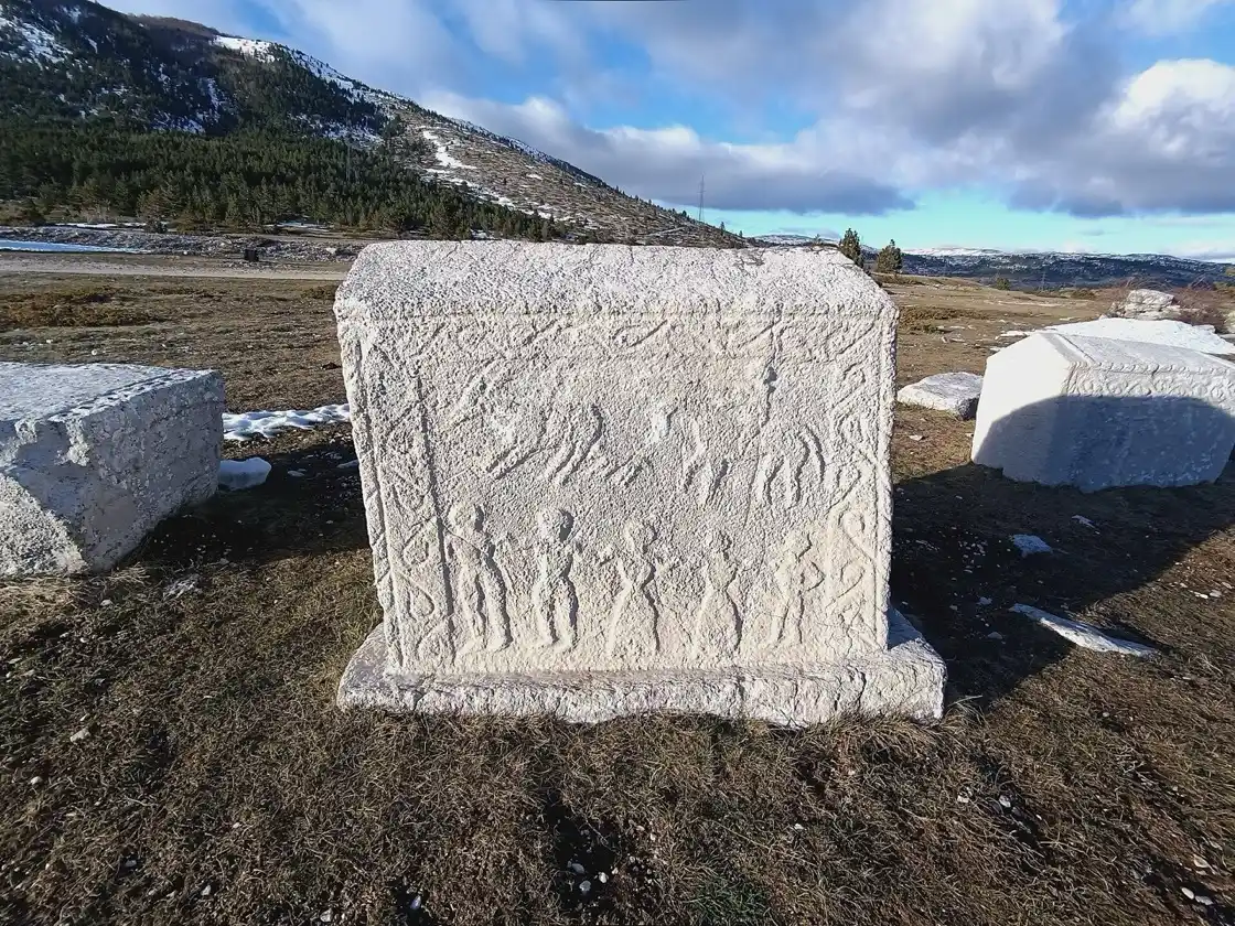 Medieval stećci tombstones scattered across the Dugo Polje necropolis on the Blidinje plateau