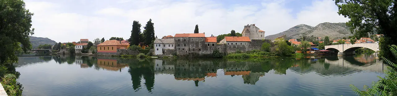 Panorama of Trebinje spread along the Trebišnjica river in southern Herzegovina, hills and greenery beyond