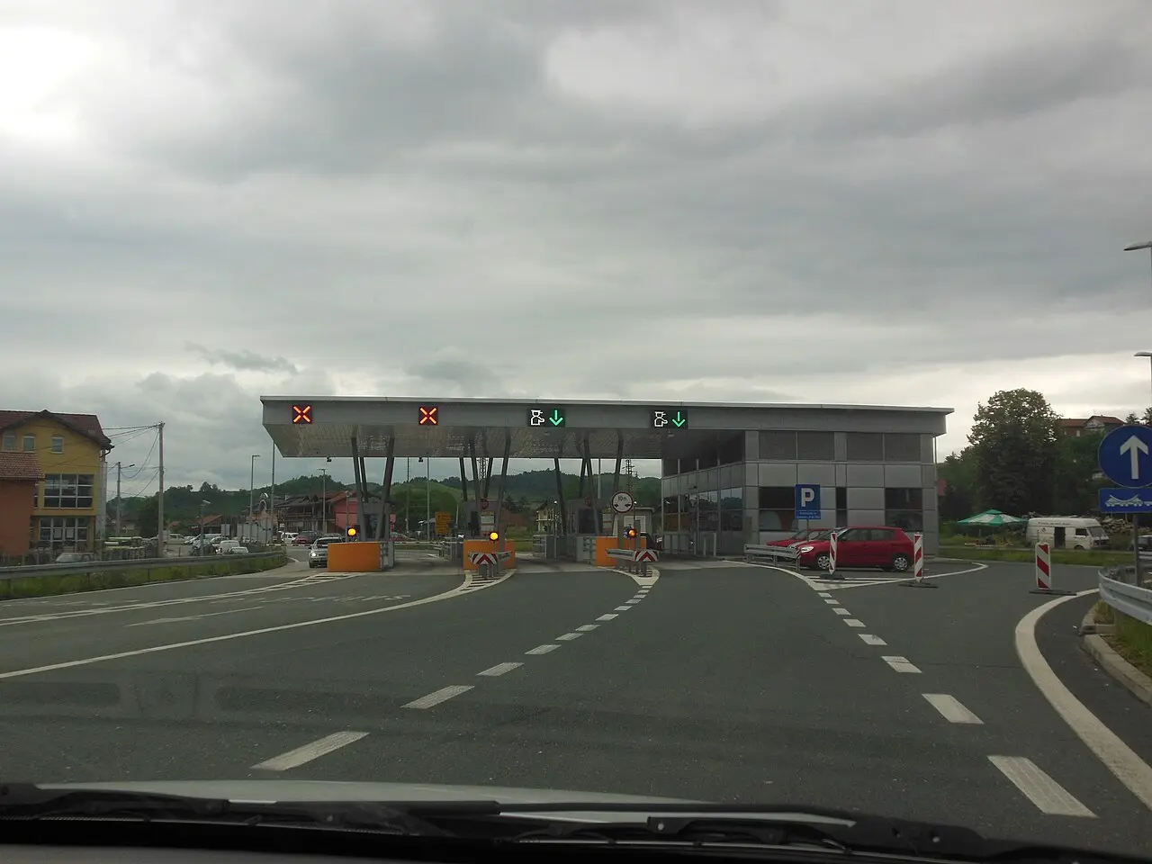 The toll plaza on the A1 motorway at the Ilijaš interchange near Sarajevo, booths and lane canopies