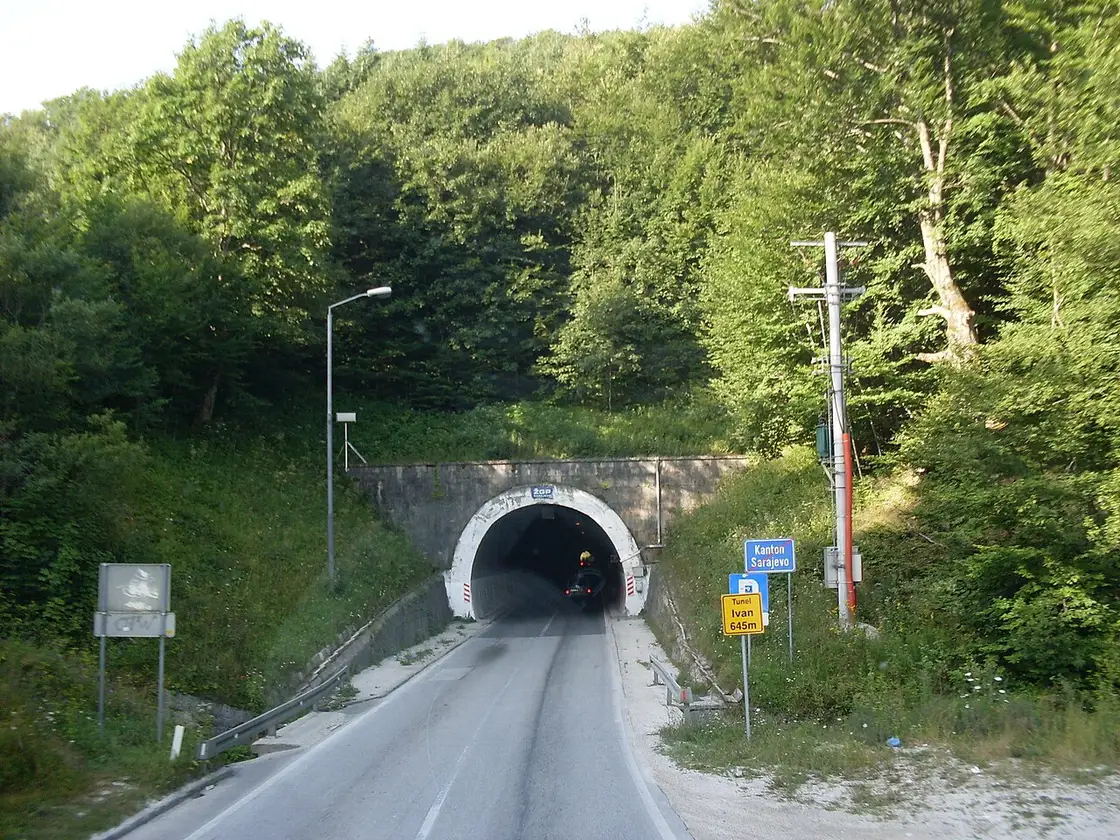 The southern portal of the Ivan tunnel on the road from Sarajevo towards Mostar, cars entering the bore