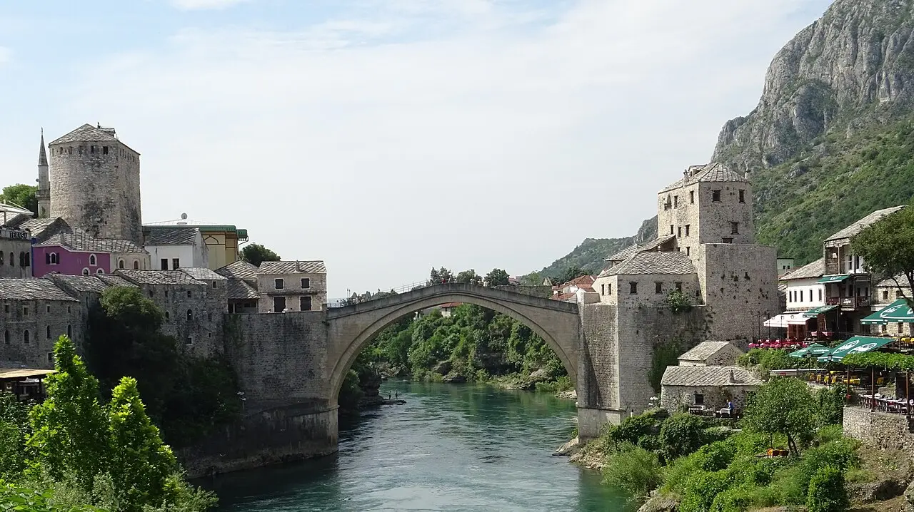 The Ottoman stone arch of the Old Bridge over the turquoise Neretva in Mostar, the destination of the day trip from Dubrovnik