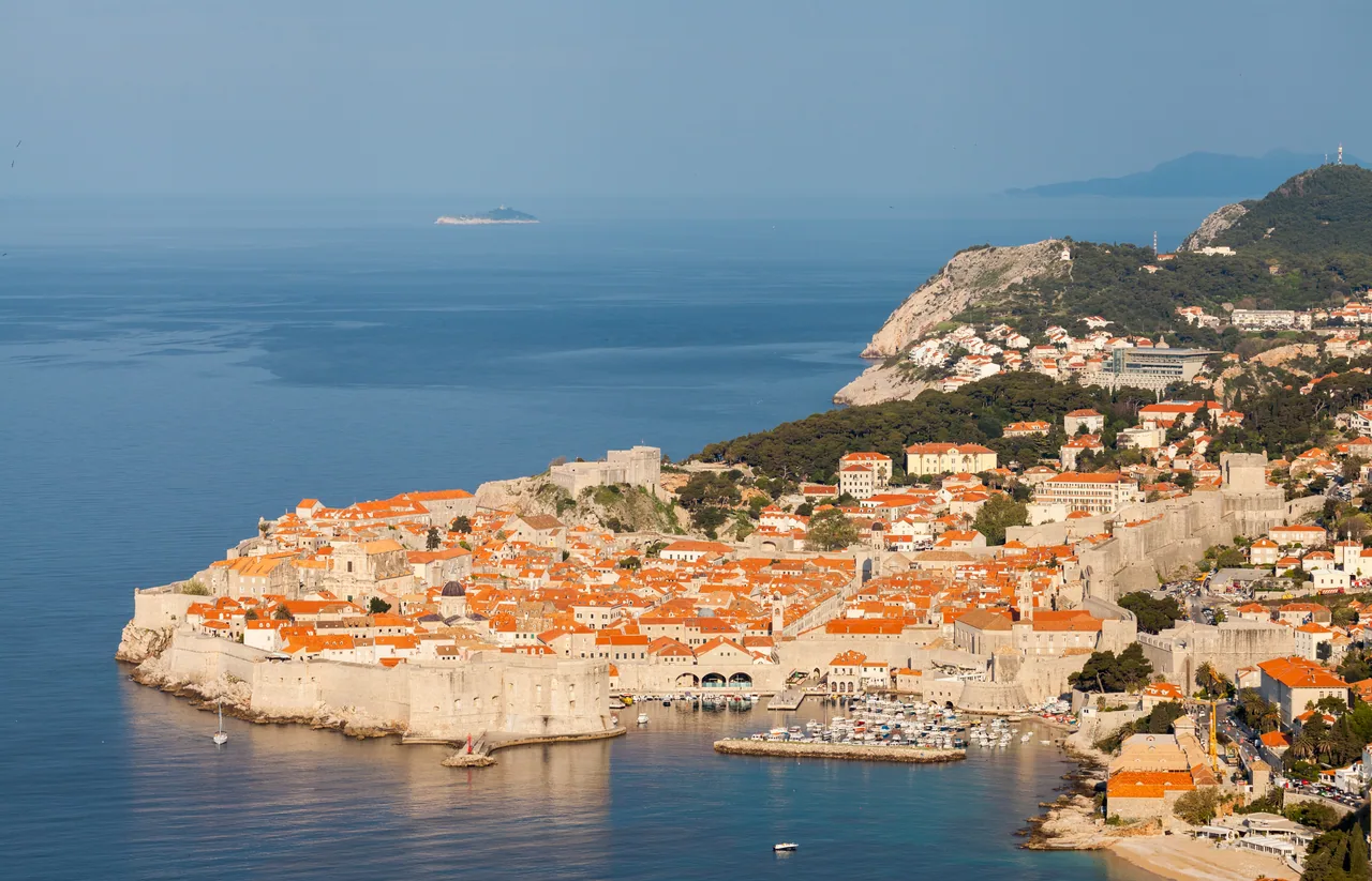 The walled old town of Dubrovnik with its terracotta rooftops beside the Adriatic, the start of the journey