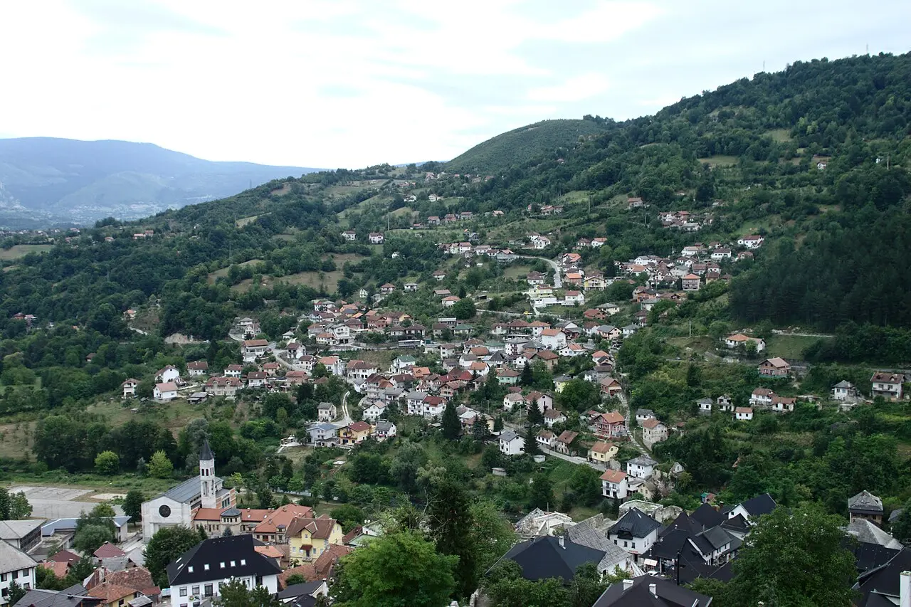 The town of Jajce in central Bosnia climbing its hill above the rivers, fortress on the summit