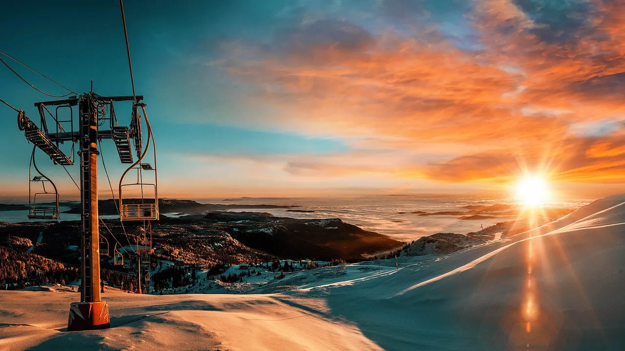 Wide snowy ridges of Jahorina under a clear winter sky, the larger of Sarajevo Olympic ski mountains