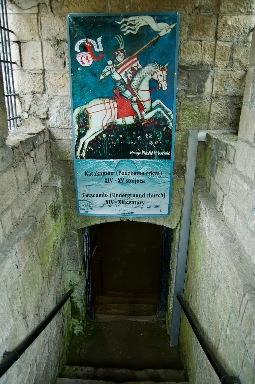 The rock-cut entrance to the medieval catacombs, an underground church in Jajce