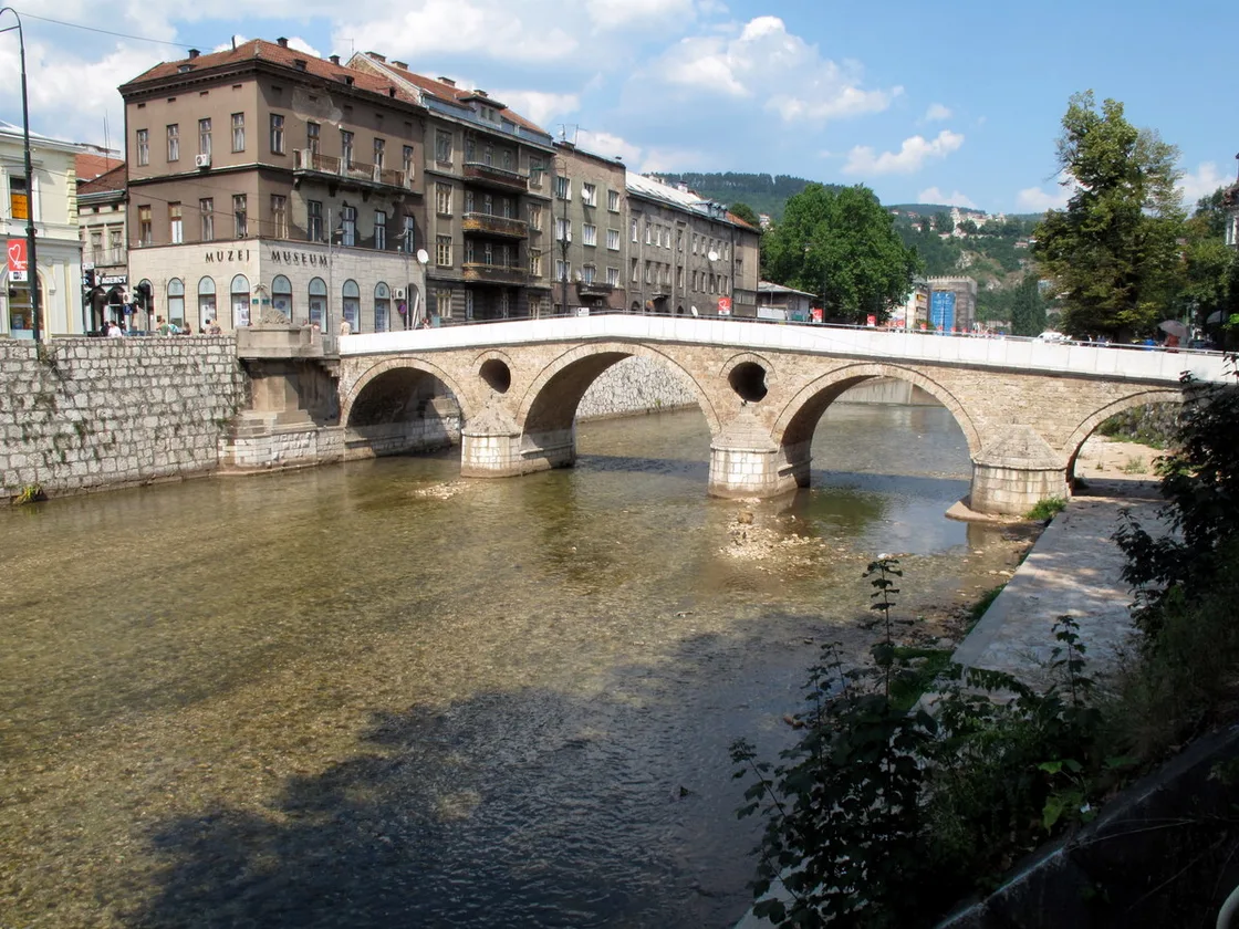The Latin Bridge and the Museum of Sarajevo 1878-1918 building seen together from across the Miljacka river