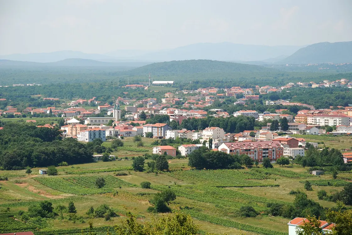 A panoramic view over the village of Medjugorje and its vineyards and hills seen from Podbrdo