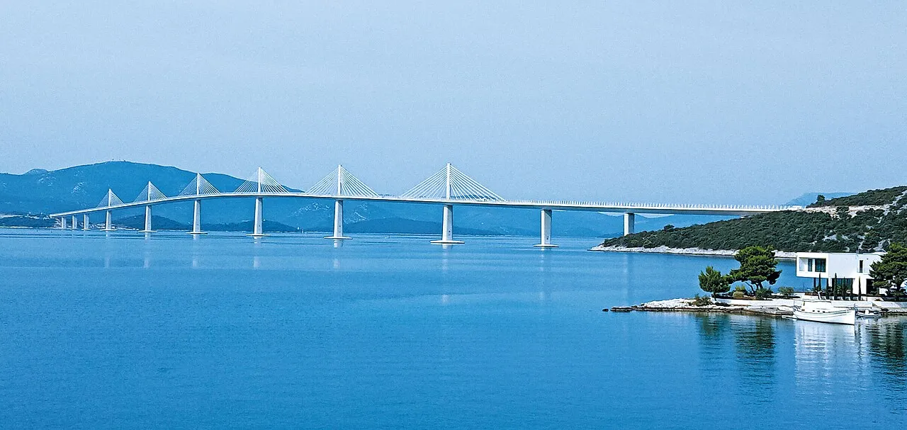 The cable-stayed Peljesac Bridge in Croatia seen from the water, the span that lets the coast road bypass the Neum strip since 2022