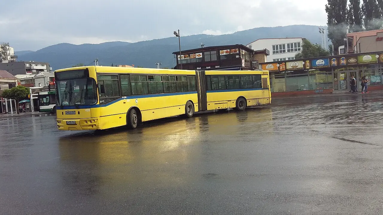 A blue GRAS city bus (Ikarbus) on a Sarajevo street