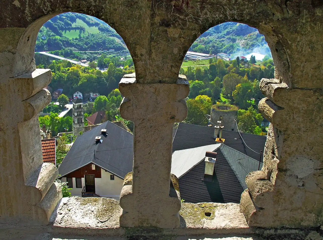 Rooftops and green hills of Jajce seen from the fortress, a common stop on the Sarajevo to Banja Luka road