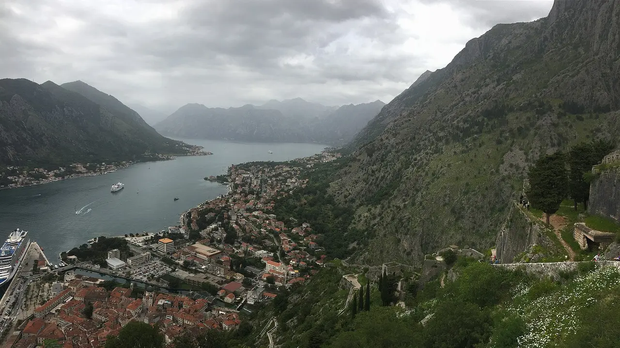 The stone fortress of Kotor climbing the mountain above the Venetian old town and the bay, the destination of the trip from Sarajevo