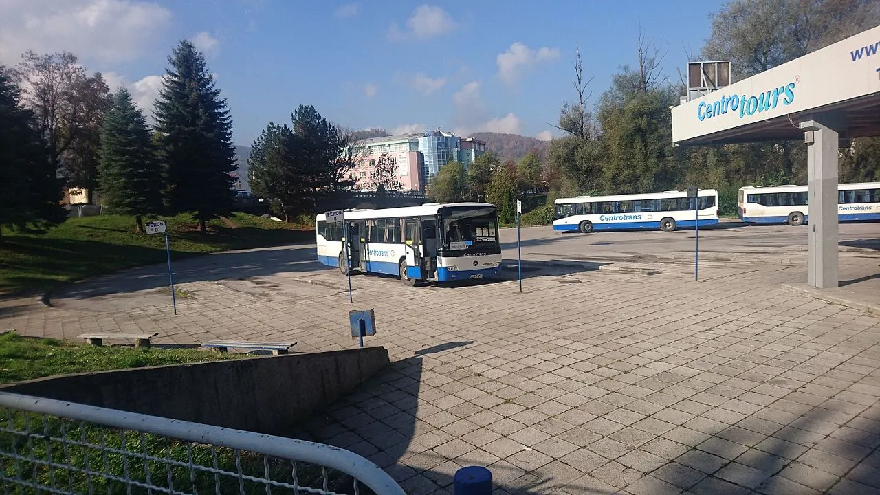 Three white and blue Centrotrans coaches parked at the bus station in Visoko, a stop on the Sarajevo to Travnik road