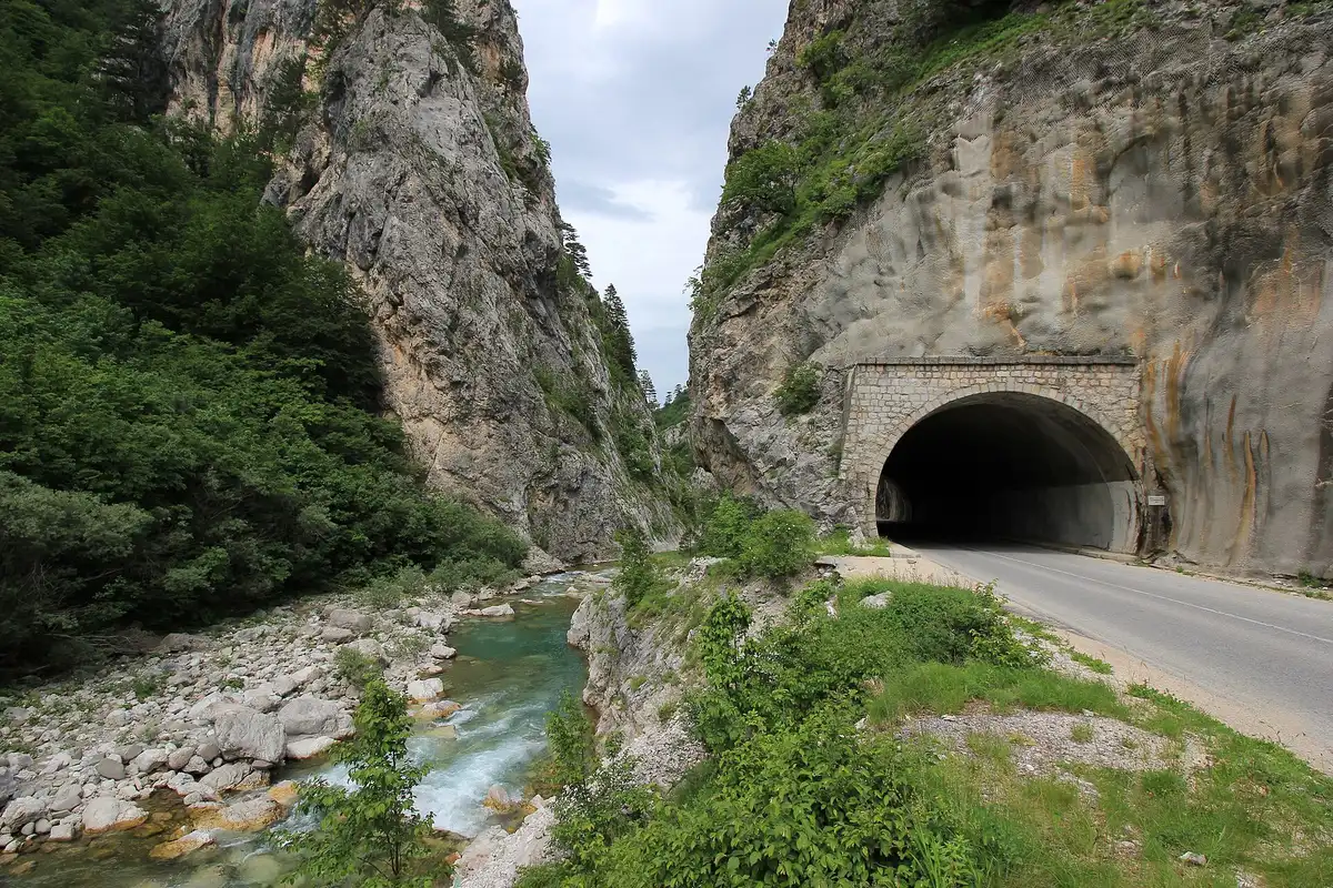 The Sutjeska river running through a deep forested canyon, the stretch of road the inland bus and the self-drive both follow