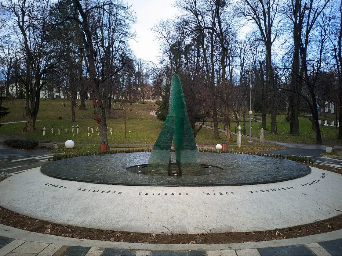 The memorial to the children killed during the siege of Sarajevo in Veliki Park, a glass sculpture ringed by a bronze band of footprints