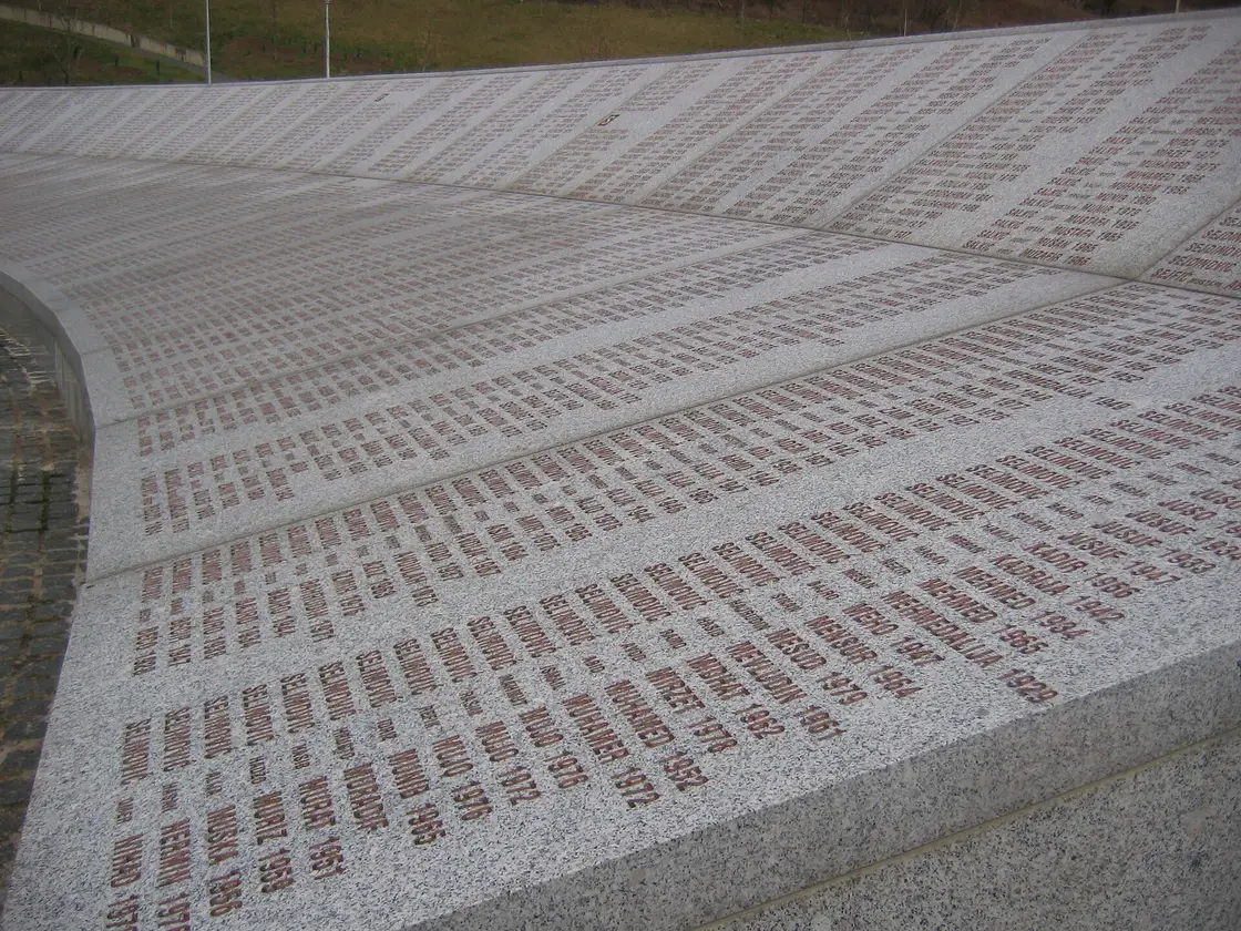 The memorial wall at Potočari engraved with the names and years of birth of thousands of victims