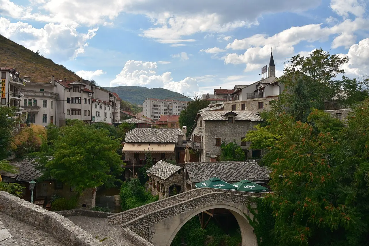 The small humpbacked Crooked Bridge (Kriva Ćuprija) over the Radobolja stream in Mostar
