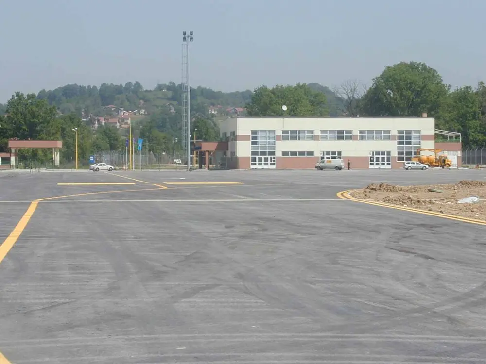 The airside apron and low terminal at Tuzla International Airport, the small budget airport in north-east Bosnia