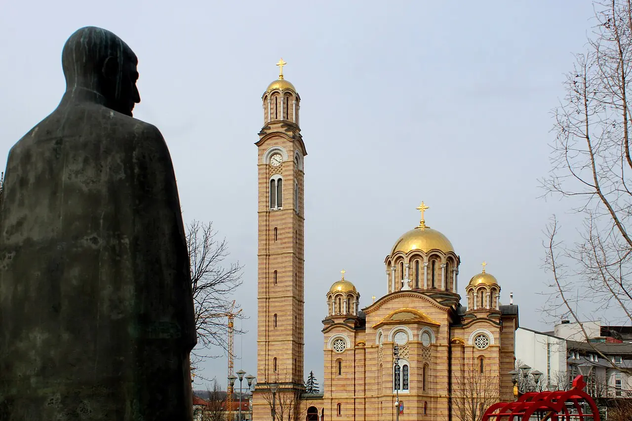 The golden stone Cathedral of Christ the Saviour in Banja Luka with its tall bell tower